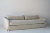 Classic Linen Skirted 3 Seater Sofa Perspective View 10
