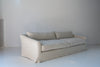 Classic Linen Skirted 3 Seater Sofa Perspective View 12