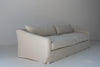 Classic Linen Skirted 3 Seater Sofa Perspective View 16