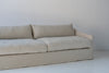 Classic Linen Skirted 3 Seater Sofa Perspective View 18