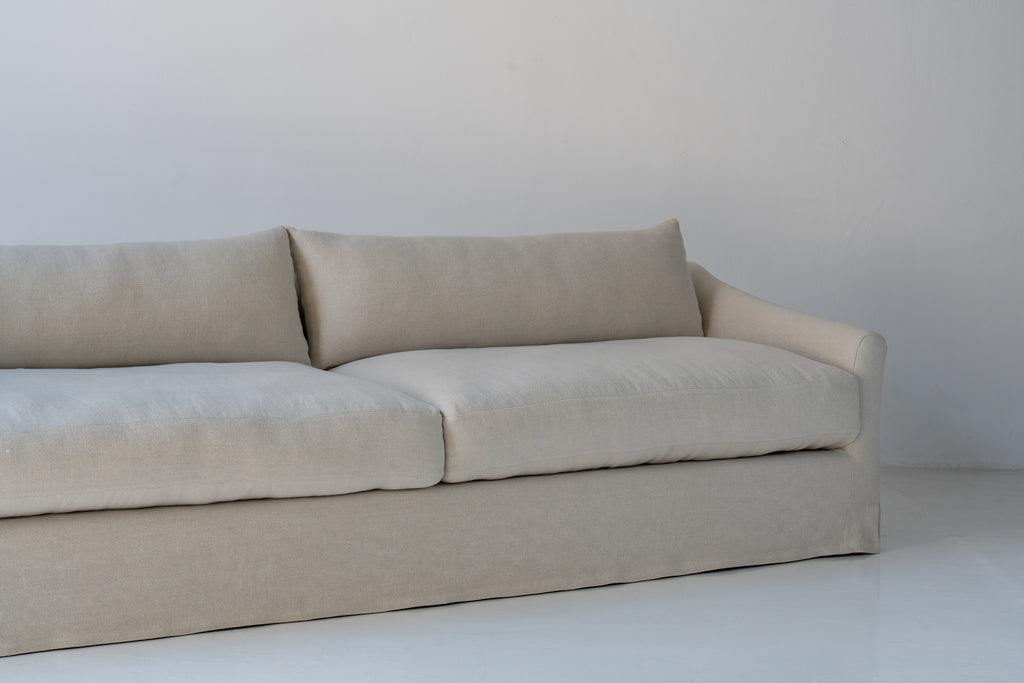 Classic Linen Skirted 3 Seater Sofa Perspective View 18