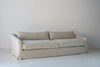 Classic Linen Skirted 3 Seater Sofa Perspective View 9