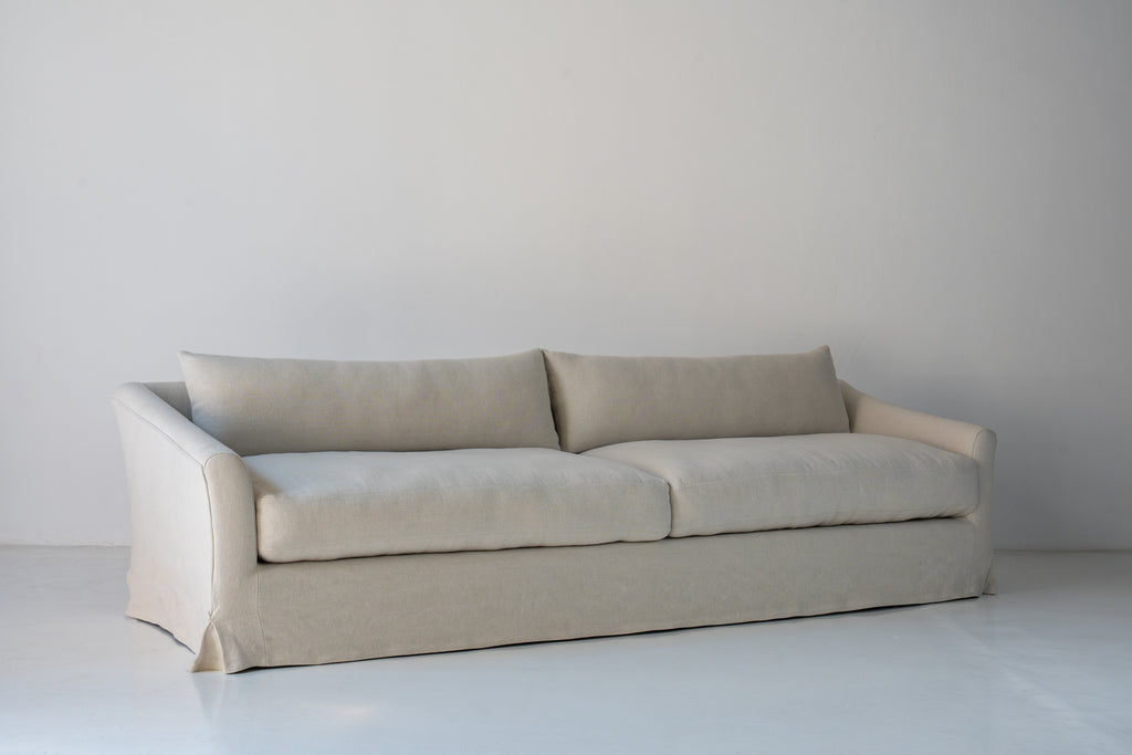 Classic Linen Skirted 3 Seater Sofa Perspective View 9