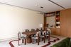 Lincoln Walnut Dining Table Indoor View 1