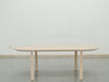Soleil Oval Dining Table Indoor Front Perspective View 1
