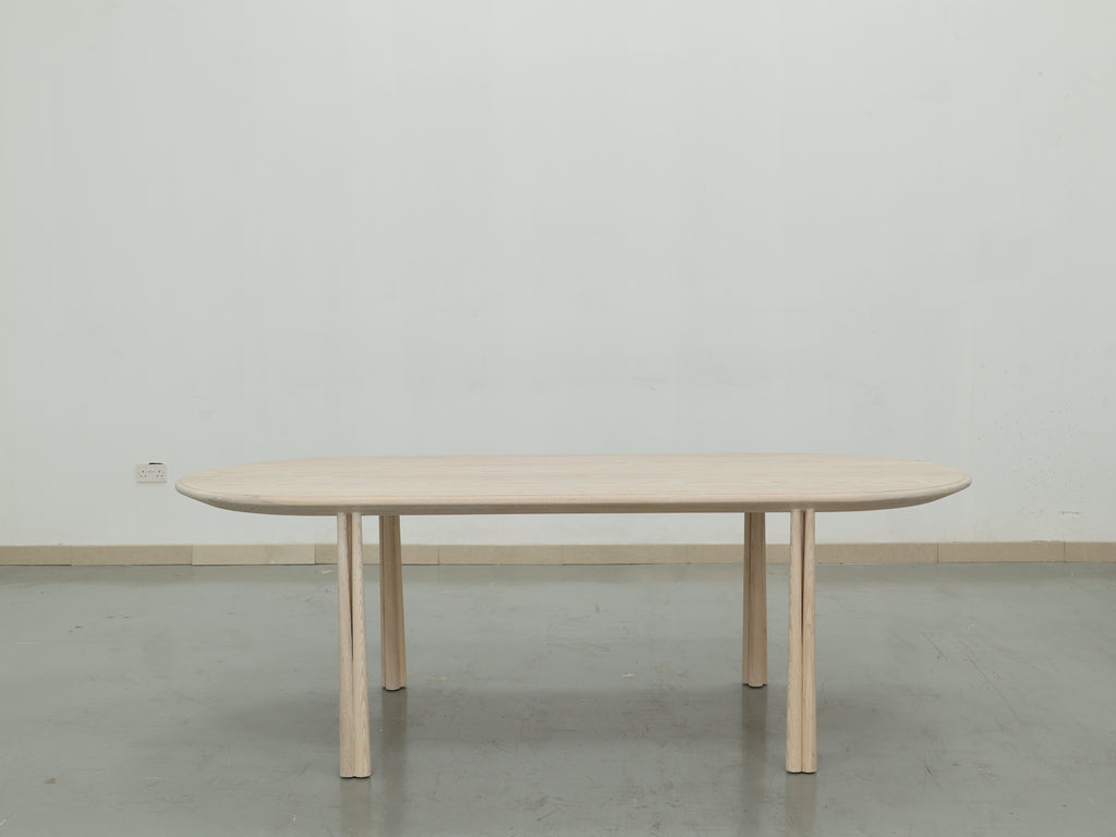 Soleil Oval Dining Table Indoor Front Perspective View 2