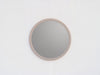 Arca 80 cm round wall mirror with wide taupe frame, styled in a modern interior