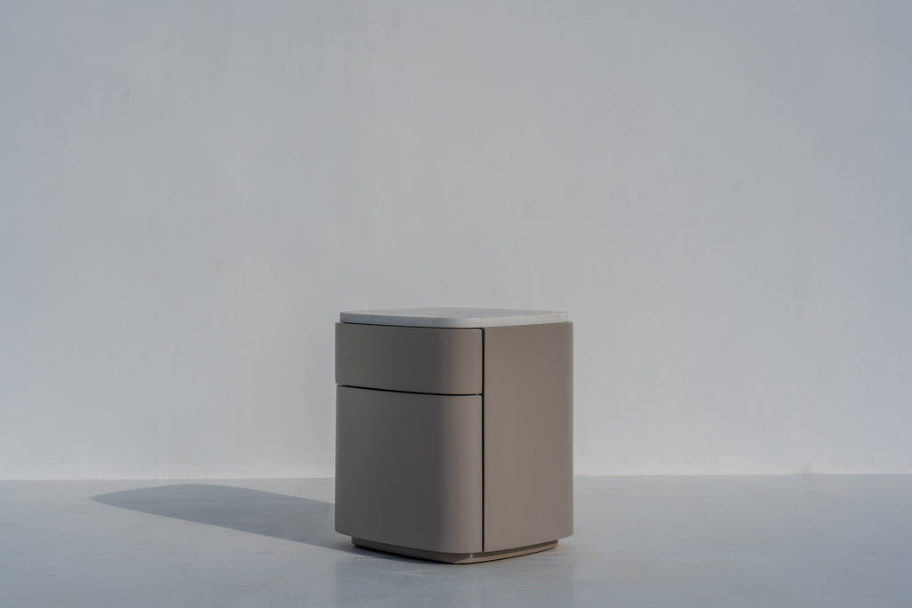 Arca curved nightstand with handle-free drawer fronts, made in Dubai by Adams Furniture