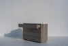 Arca chest of drawers with a drawer open, taupe PU finish