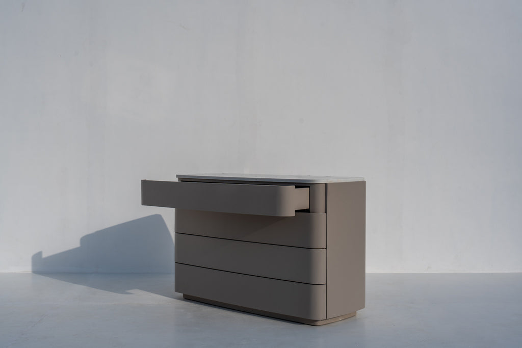 Arca chest of drawers with a drawer open, taupe PU finish