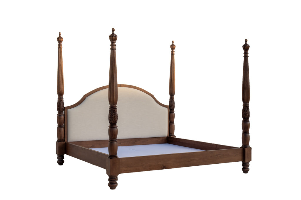 Side angle of the Williamsburg four poster bed with acanthus-carved posts and turned vase feet