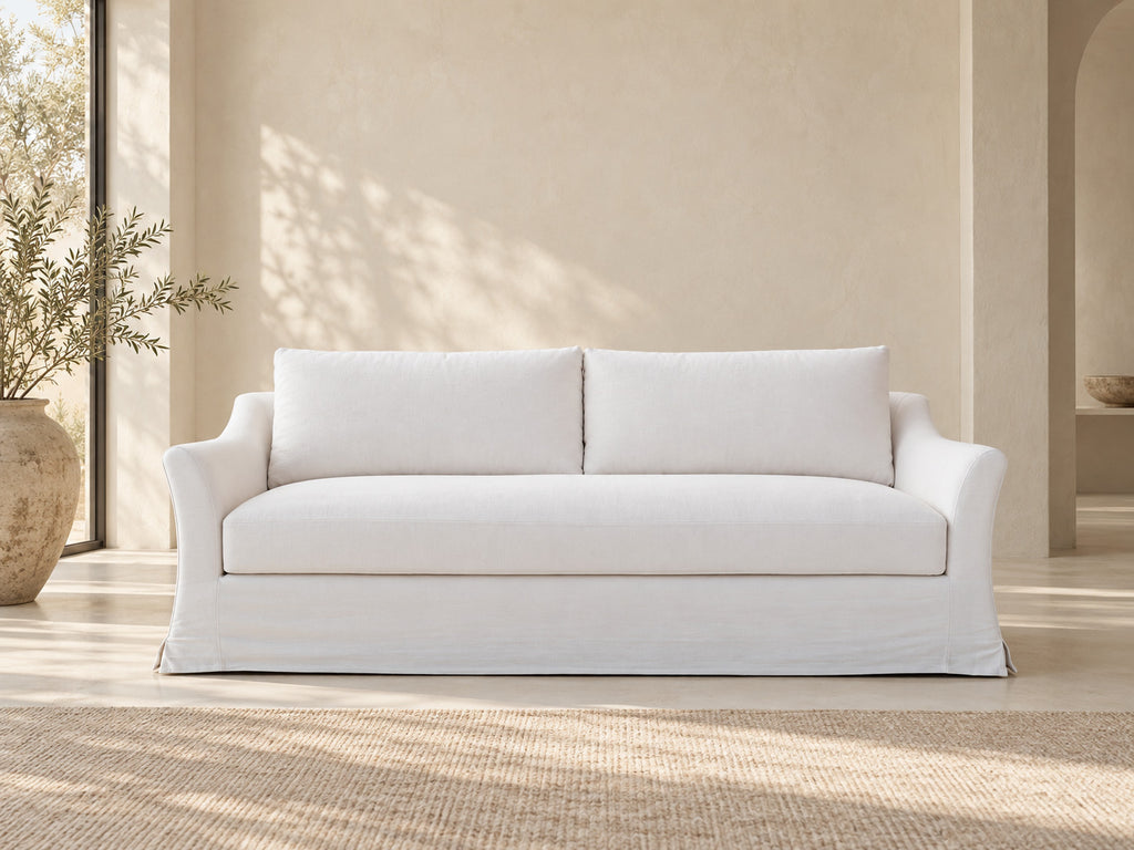 Belmont white Belgian linen slipcovered sofa in a neutral Dubai living room, front view