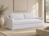 Belmont Belgian linen sofa with flared slope arms and travertine coffee table, angled view