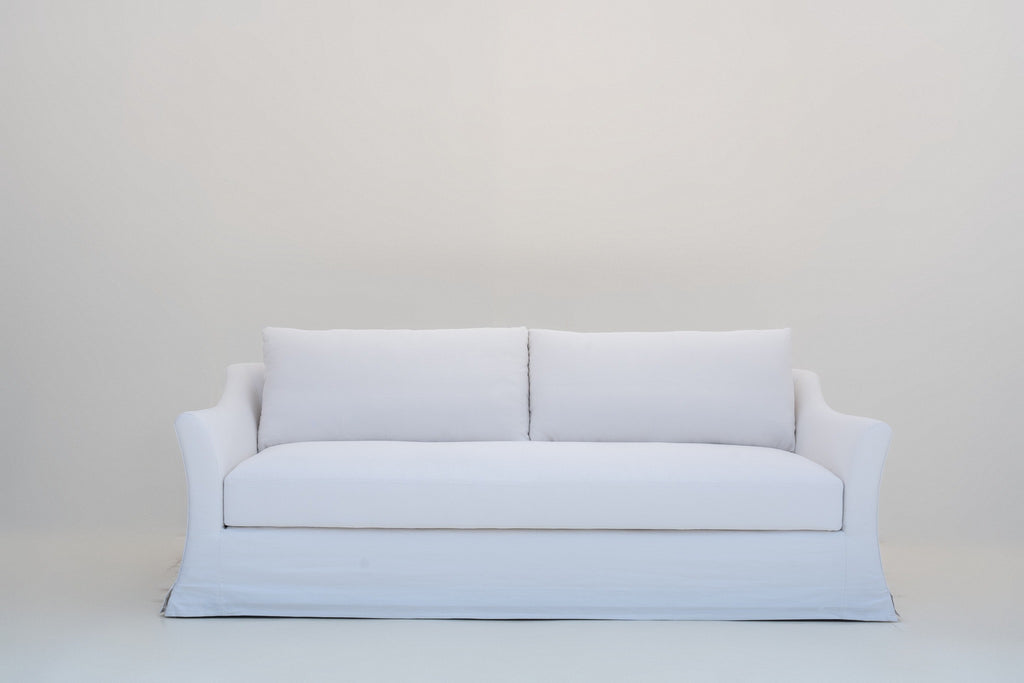 Belmont linen sofa front elevation with tailored skirt and corner kick pleats