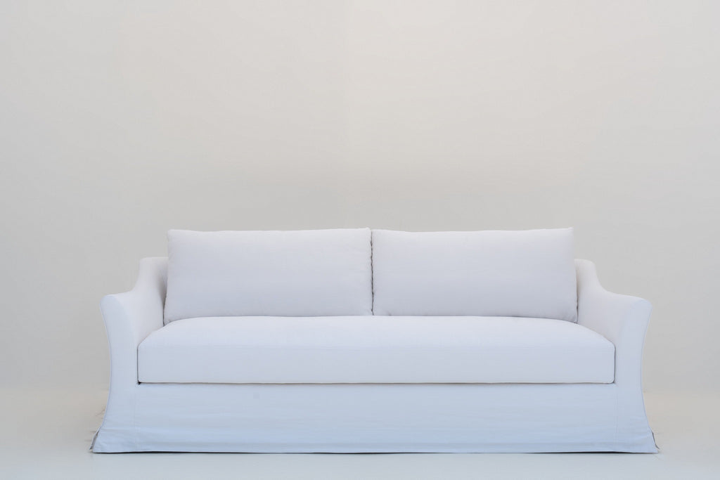 Belmont white slipcovered sofa by Adams Furniture Dubai, close front view