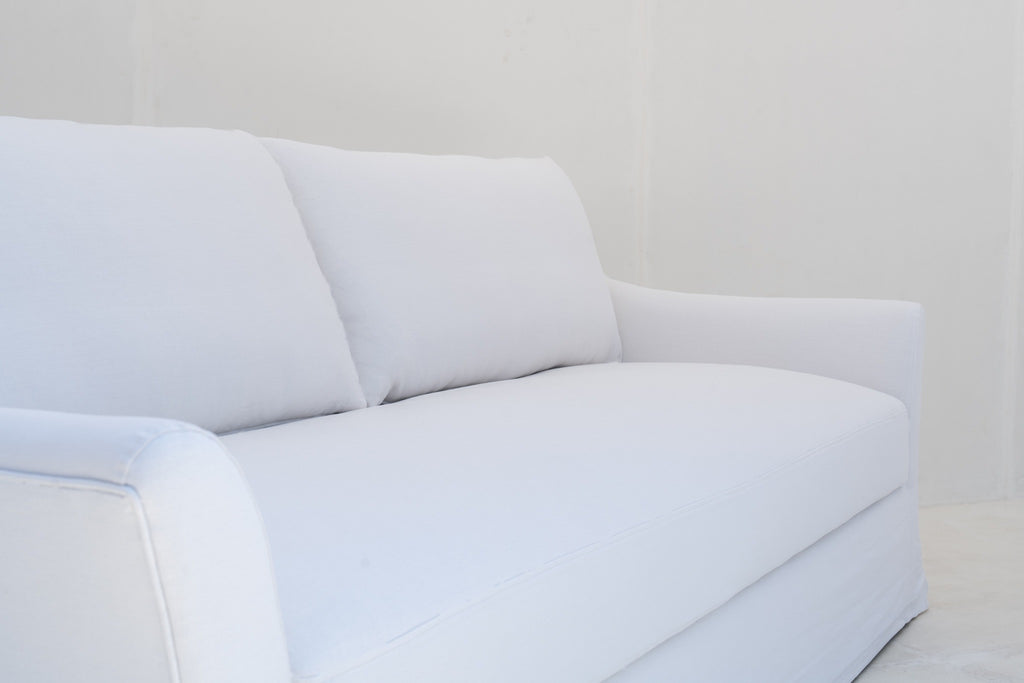 Close-up of the Belmont bench seat cushion, welt edge and Belgian linen texture