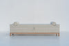 Carmel bedroom bench with two round bolster cushions, front elevation