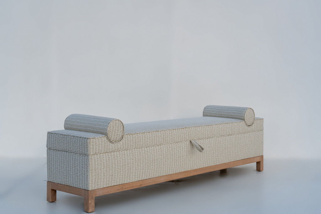 Carmel bolster storage bench three-quarter view, tailored upholstered bench on oak legs