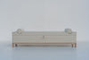 Carmel bolster storage bench front view, sand print upholstery on a solid oak base, made in Dubai