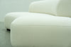 Close-up of the soft looped bouclé fabric on the Dune curved sofa