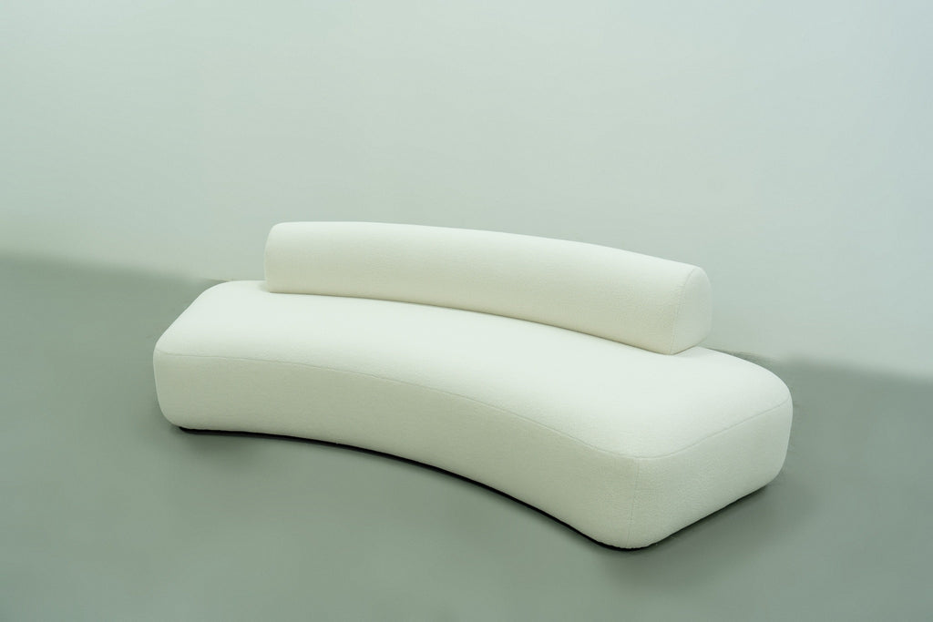 Curved sofa in Dubai, the Dune in white bouclé, angled view from above