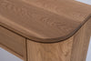 Solid oak console table with softly rounded corners and natural oak finish