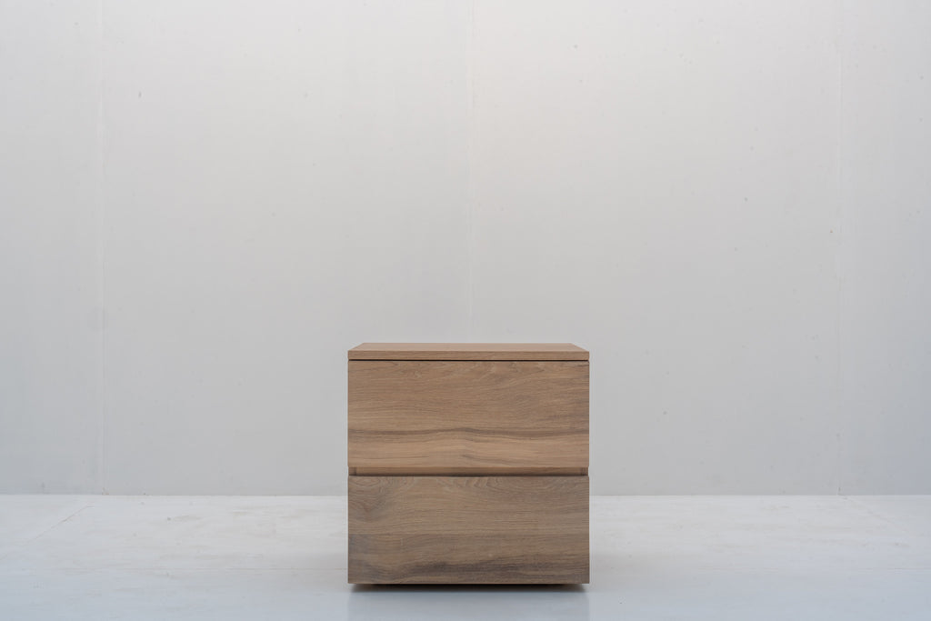 Minimalist natural oak bedside table with two handle-free drawers