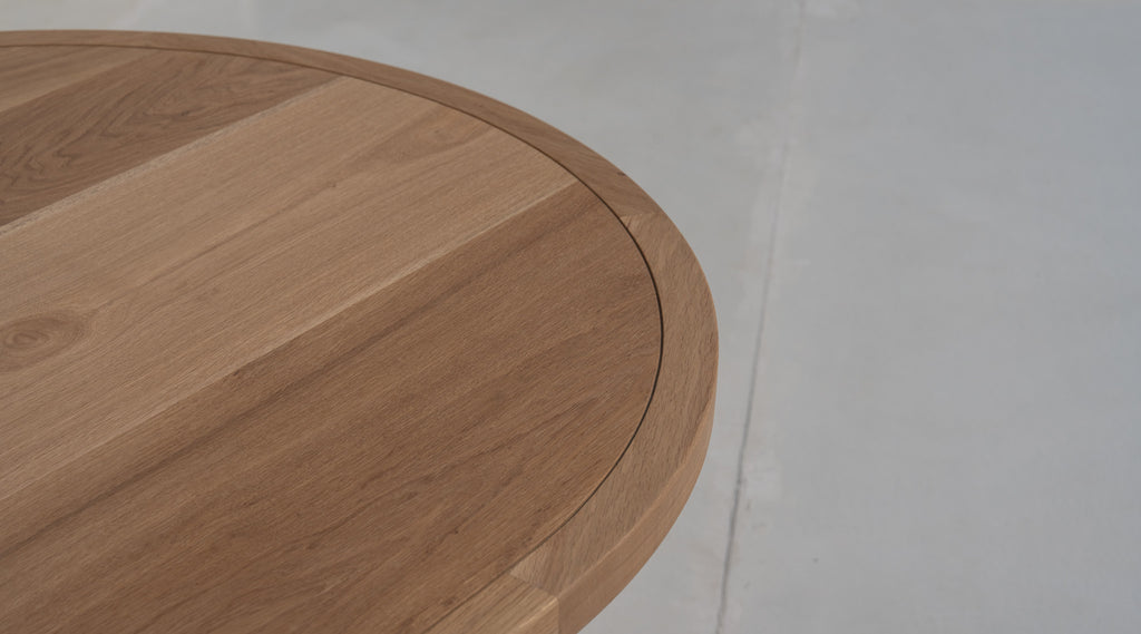 Calder solid oak oval dining table with fluted pedestal legs in Dubai