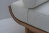 Close-up of premium bouclé upholstery on Selo oak bench