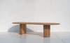 Oval solid oak dining table with sculptural fluted oak pedestal base