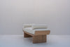 Side profile of solid oak bouclé upholstered bedroom bench