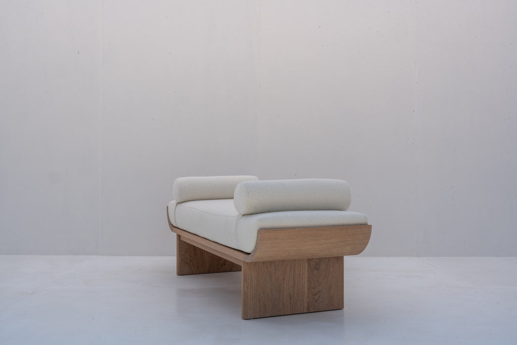 Side profile of solid oak bouclé upholstered bedroom bench