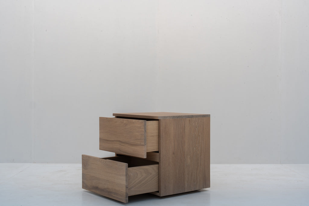 Aven Oak Bedside Table in Dubai with both storage drawers open