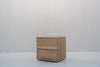 Minimalist natural oak bedside table with two handle-free drawers