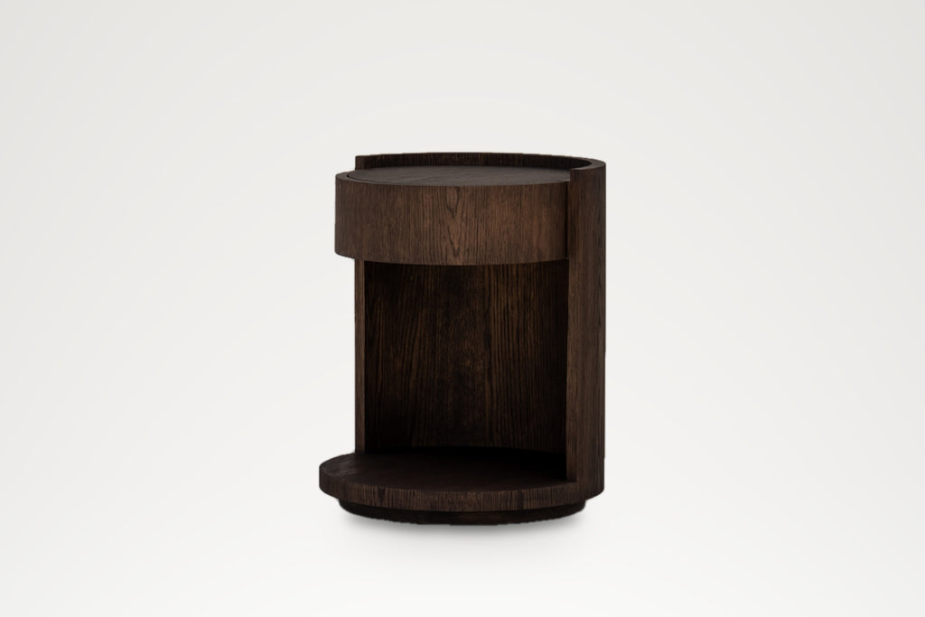 Holland Park bedside table, three-quarter view showing the curved side and open shelf