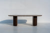 Livia brown marble dining table on two D-shaped fluted walnut pedestals