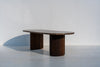 Livia oval marble dining table on two fluted walnut pedestal legs, made in Dubai
