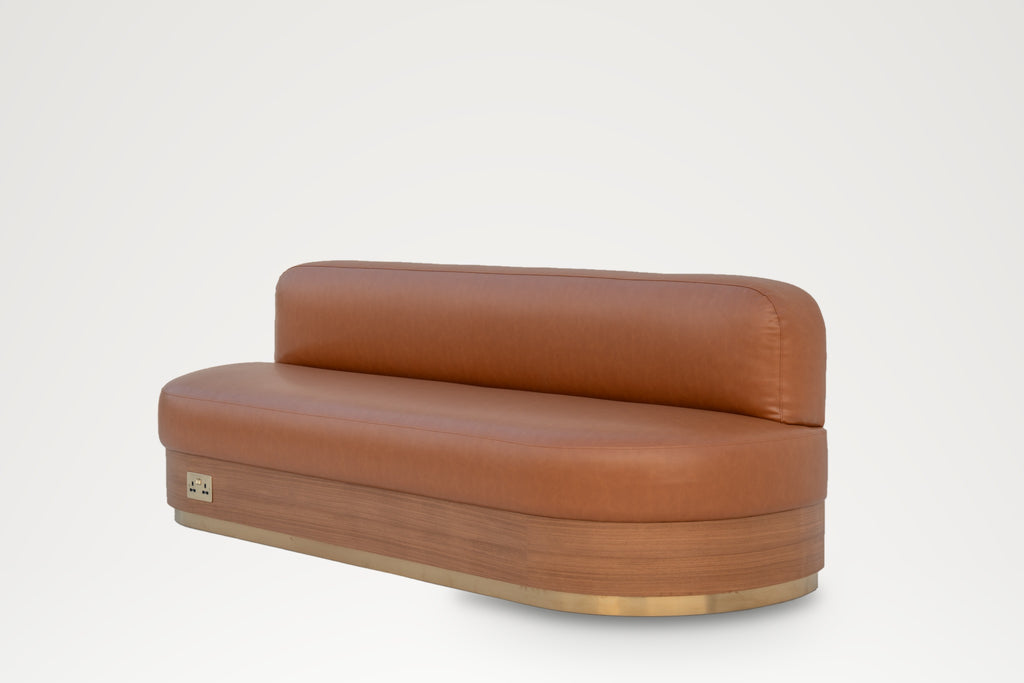 Made-to-measure leather banquette with brass finishes for restaurants and homes in Dubai
