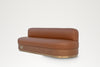 Restaurant booth banquette in tan leather with built-in power socket and brass plinth