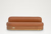 Leather banquette seating with wood-veneer plinth and brass socket, straight-on view