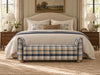 Nantucket check storage bench at the end of a king bed in a coastal bedroom, Adams Furniture Dubai