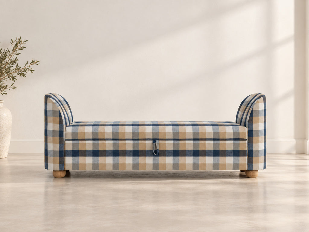 Blue and sand check storage bench with rounded arms and bun feet in a bright room, made in Dubai