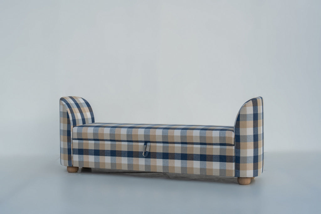 Nantucket storage bench angled view with rounded arm and solid wood bun feet