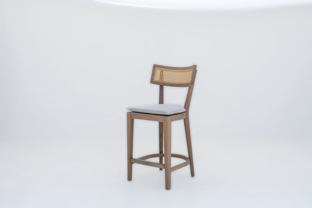 Cane back bar stool in Dubai, the Ojai in solid oak, side angle