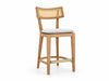 Ojai solid oak bar chair with cane back and linen seat pad on a white background, front angle