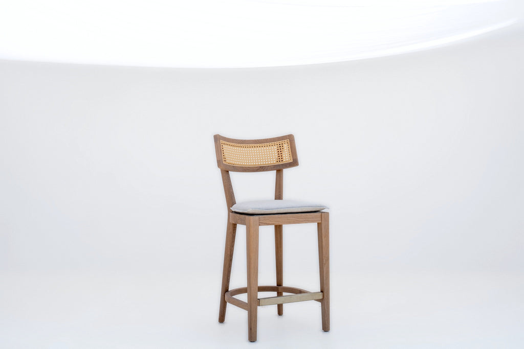 Ojai Oak & Cane Bar Chair in solid oak with natural cane back and linen seat pad, front view, made in Dubai