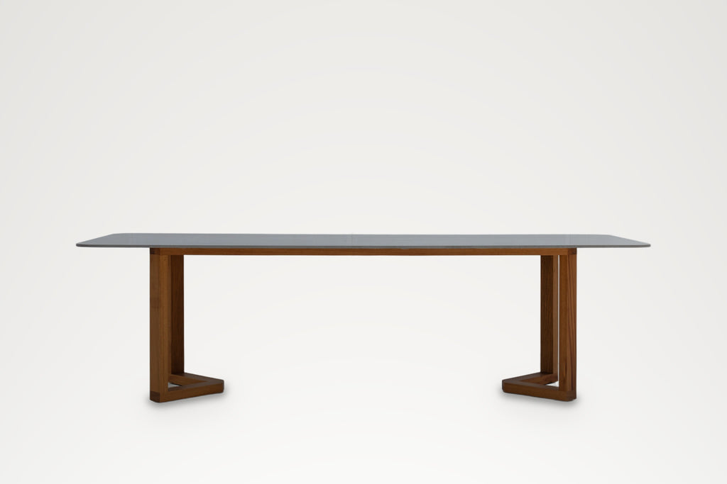Pietra 260 cm stone top dining table on teak frame legs, straight-on view