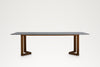 Front elevation of the Pietra indoor-outdoor dining table with sintered stone top