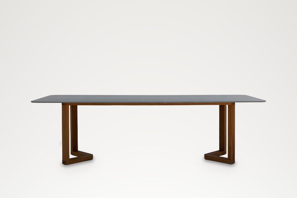 Front elevation of the Pietra indoor-outdoor dining table with sintered stone top