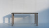 Pietra outdoor high table in grey stone and weathered teak, made to order in Dubai